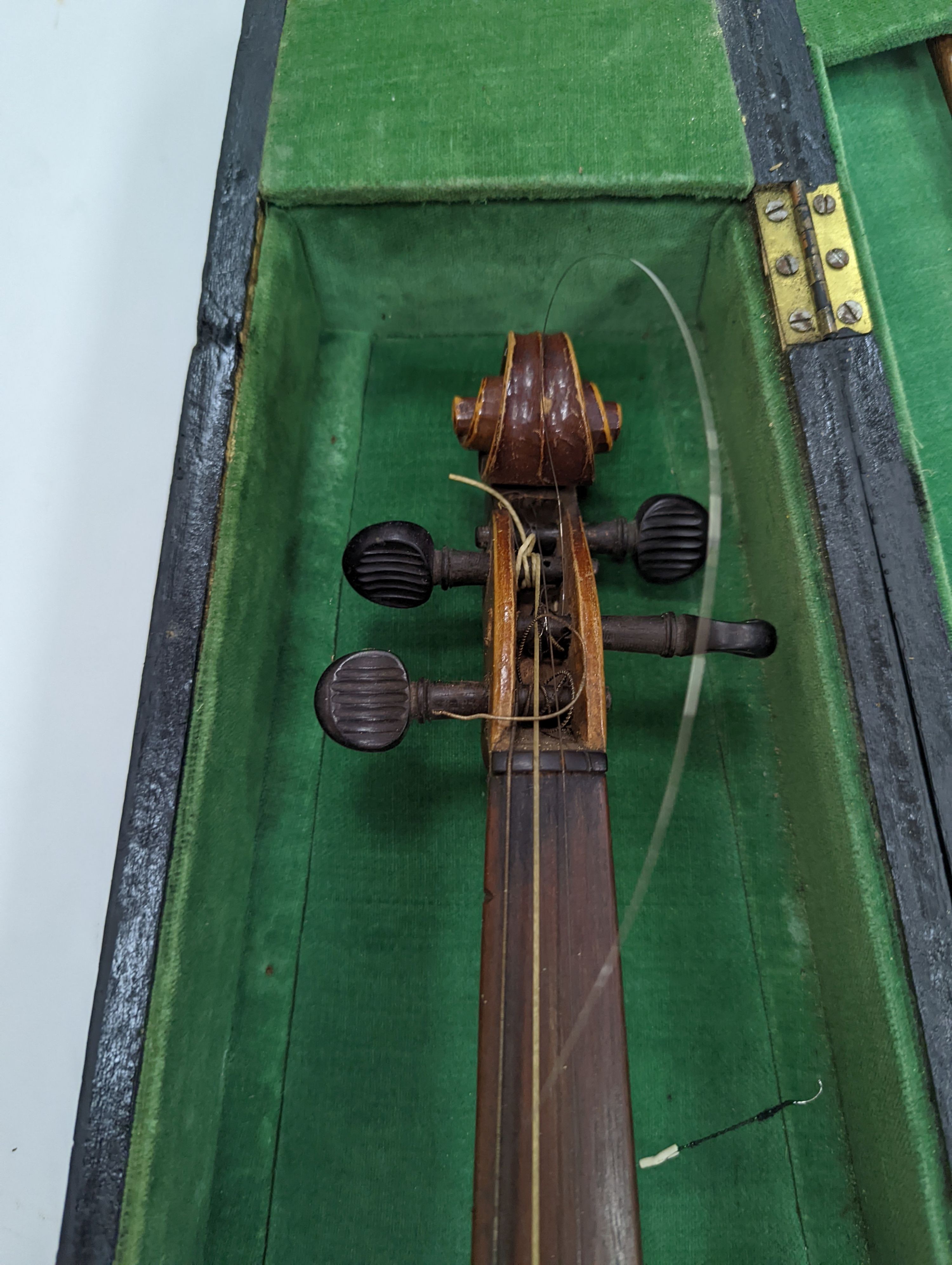 Two cased violins and bows, one with ‘Antonius Straduarius Cremonensis Faciebat Anno 17/13 Made In Czechoslovakia’ label to interior
